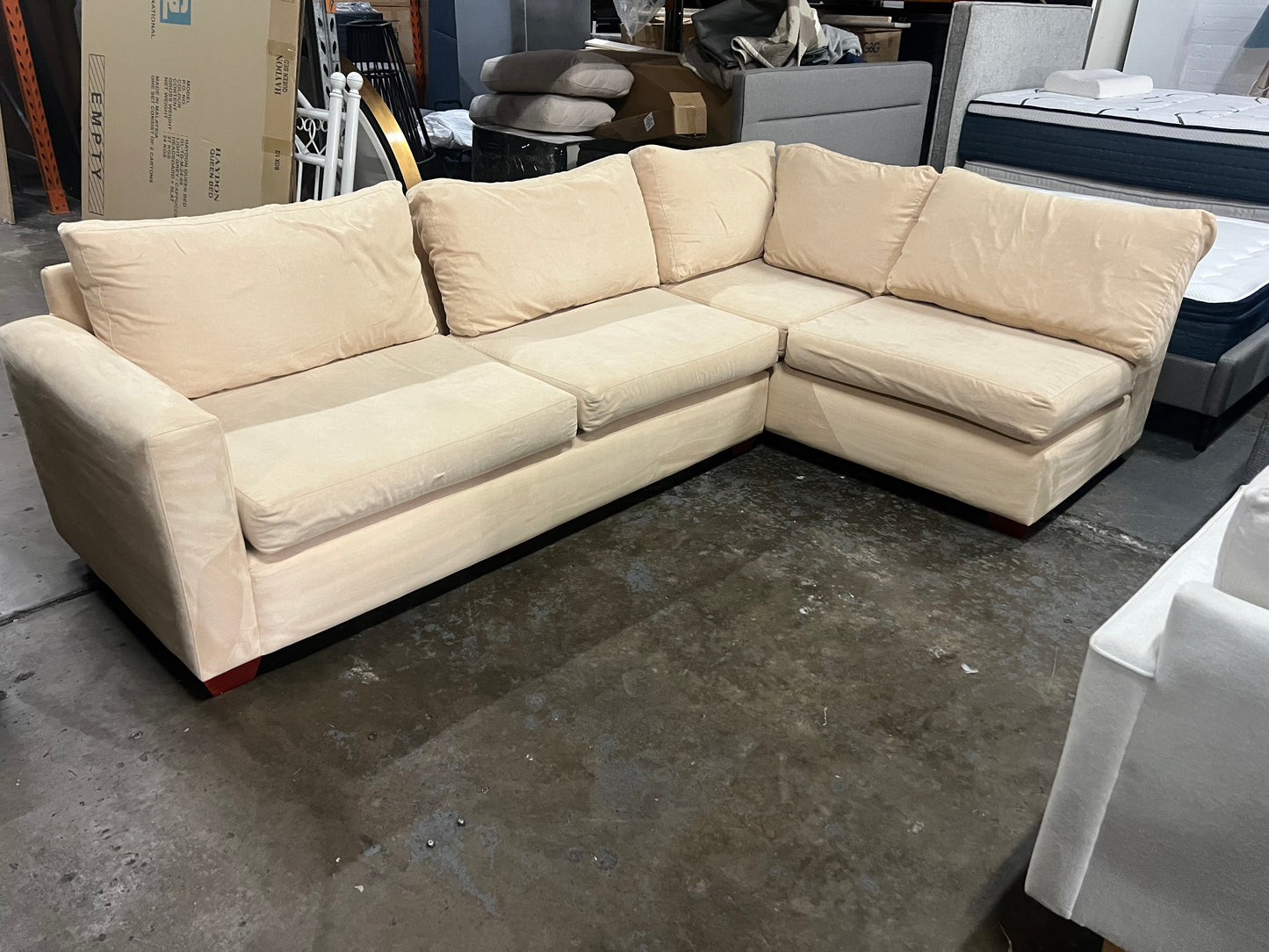 Affordable beige color 4-5 seater sofa.