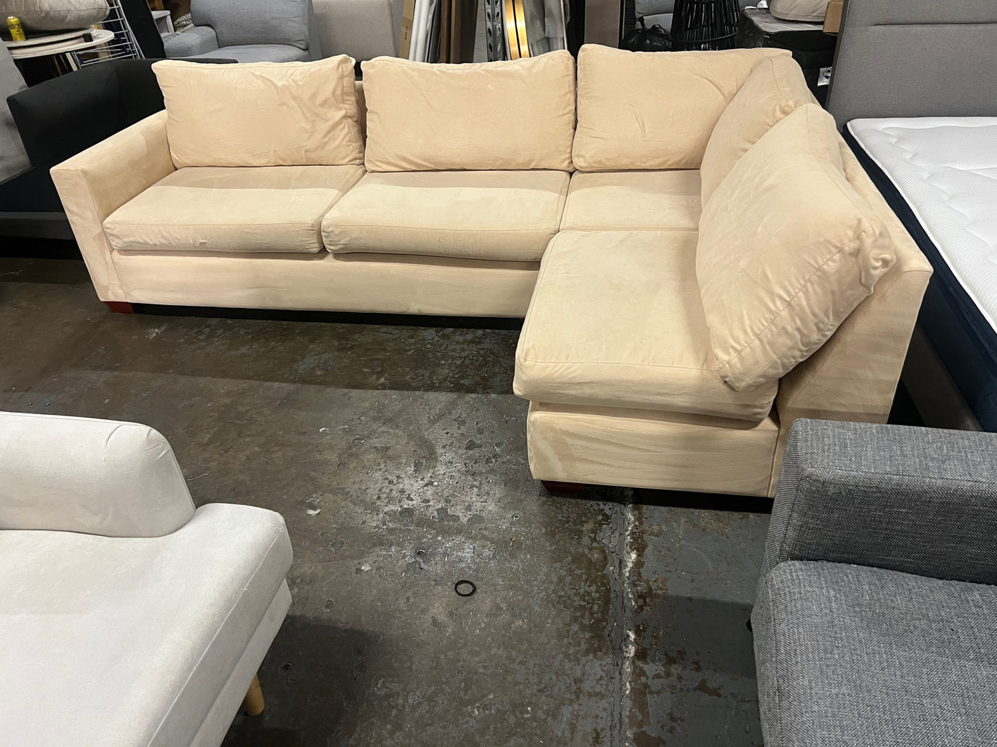 Affordable beige color 4-5 seater sofa.