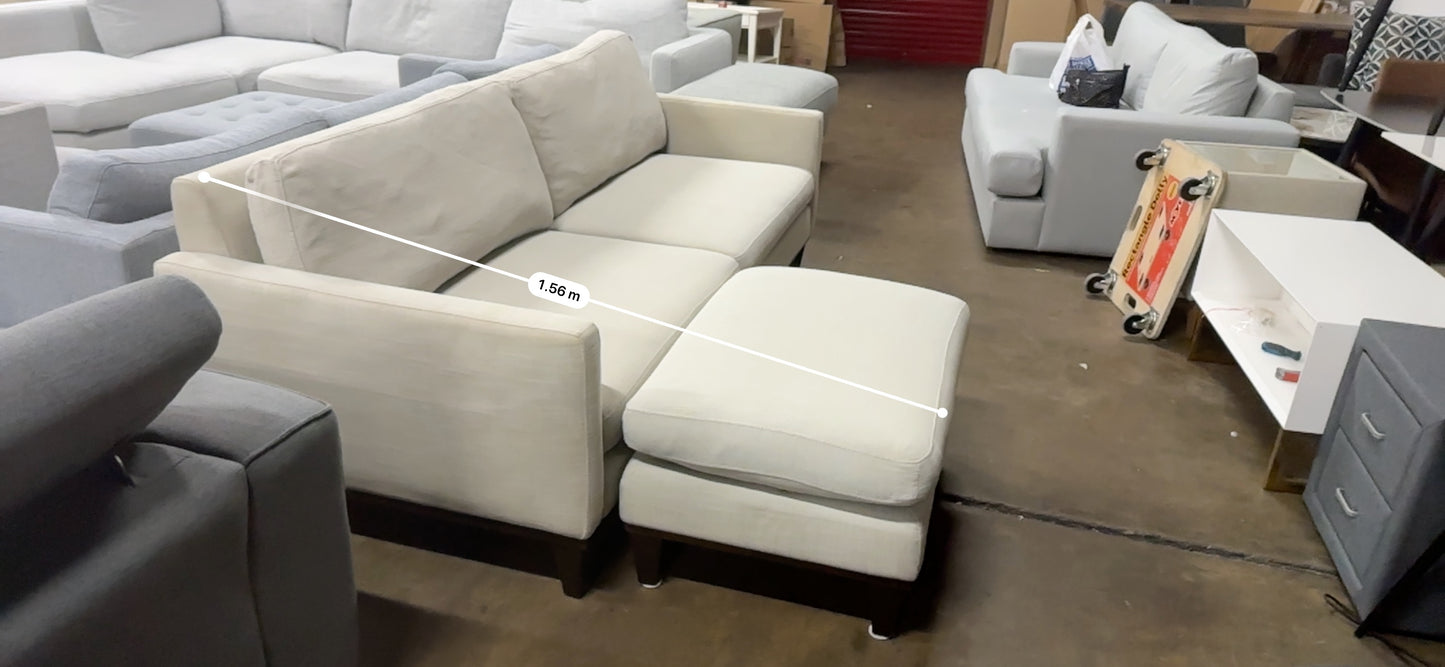 Affordable light grey color 2.5 seater and matching ottoman.