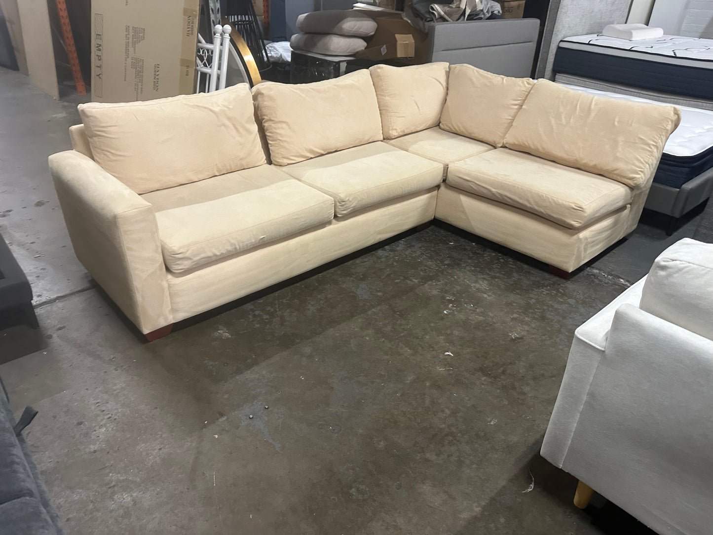 Affordable beige color 4-5 seater sofa.