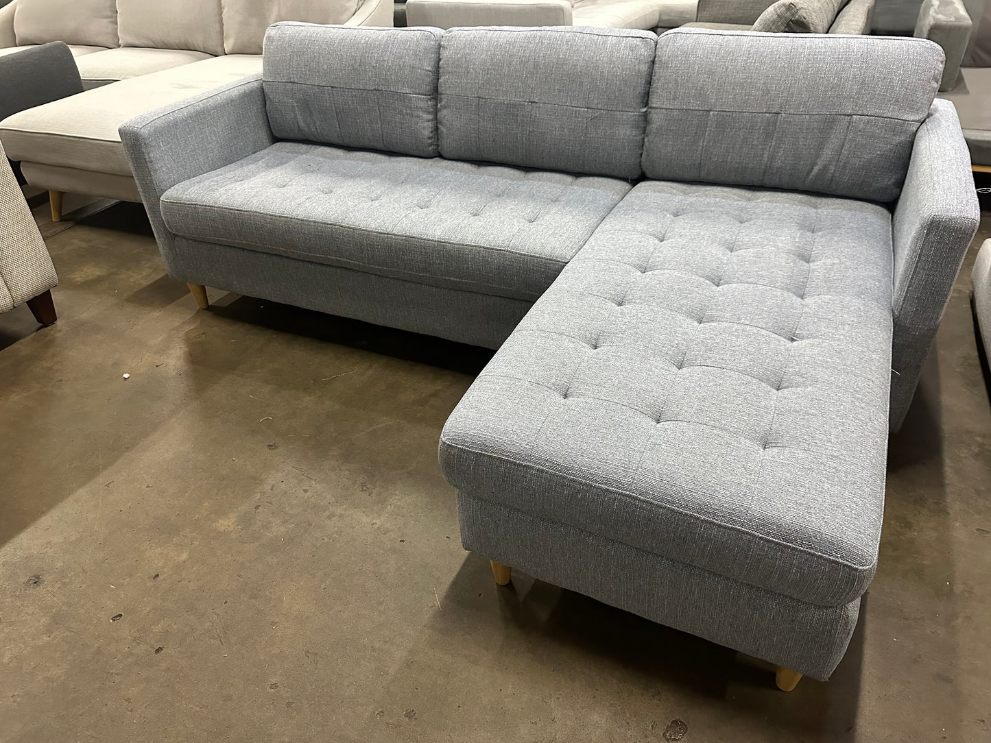 Light blue color reversible chaise L shape Sofa (Pre-Owned). Perfect as new lounge lovers brand
