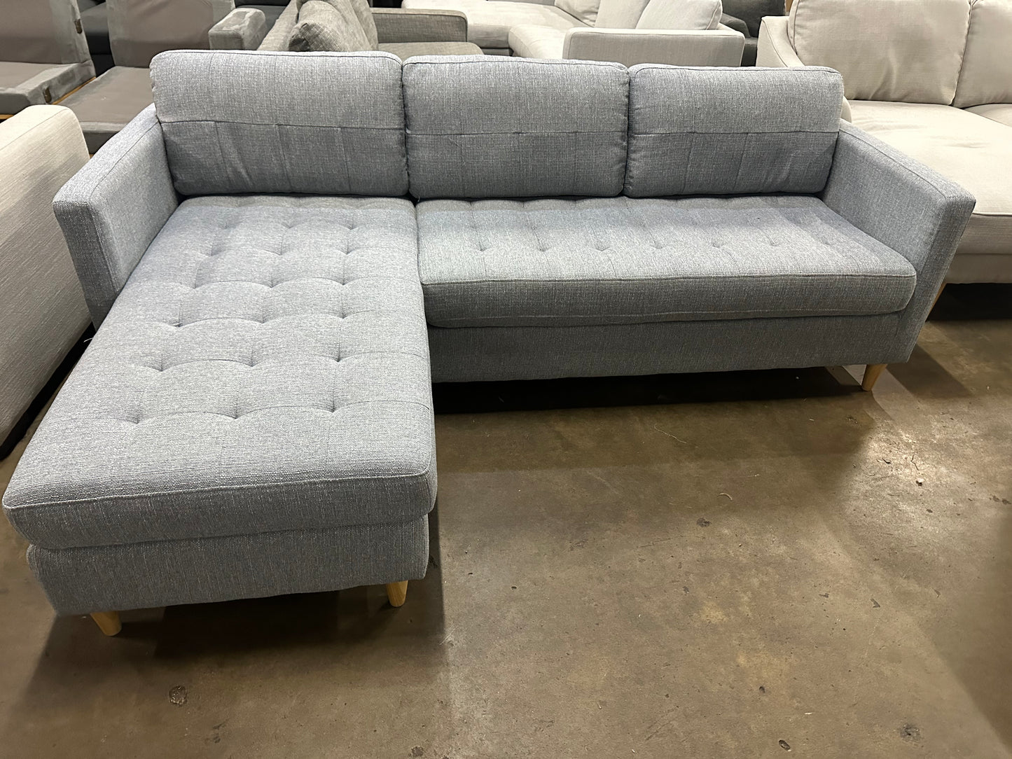 Light blue color reversible chaise L shape Sofa (Pre-Owned). Perfect as new lounge lovers brand