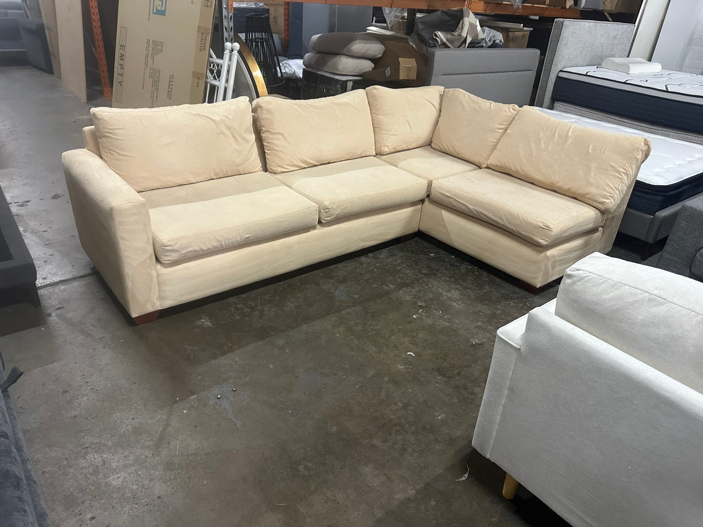 Affordable beige color 4-5 seater sofa.