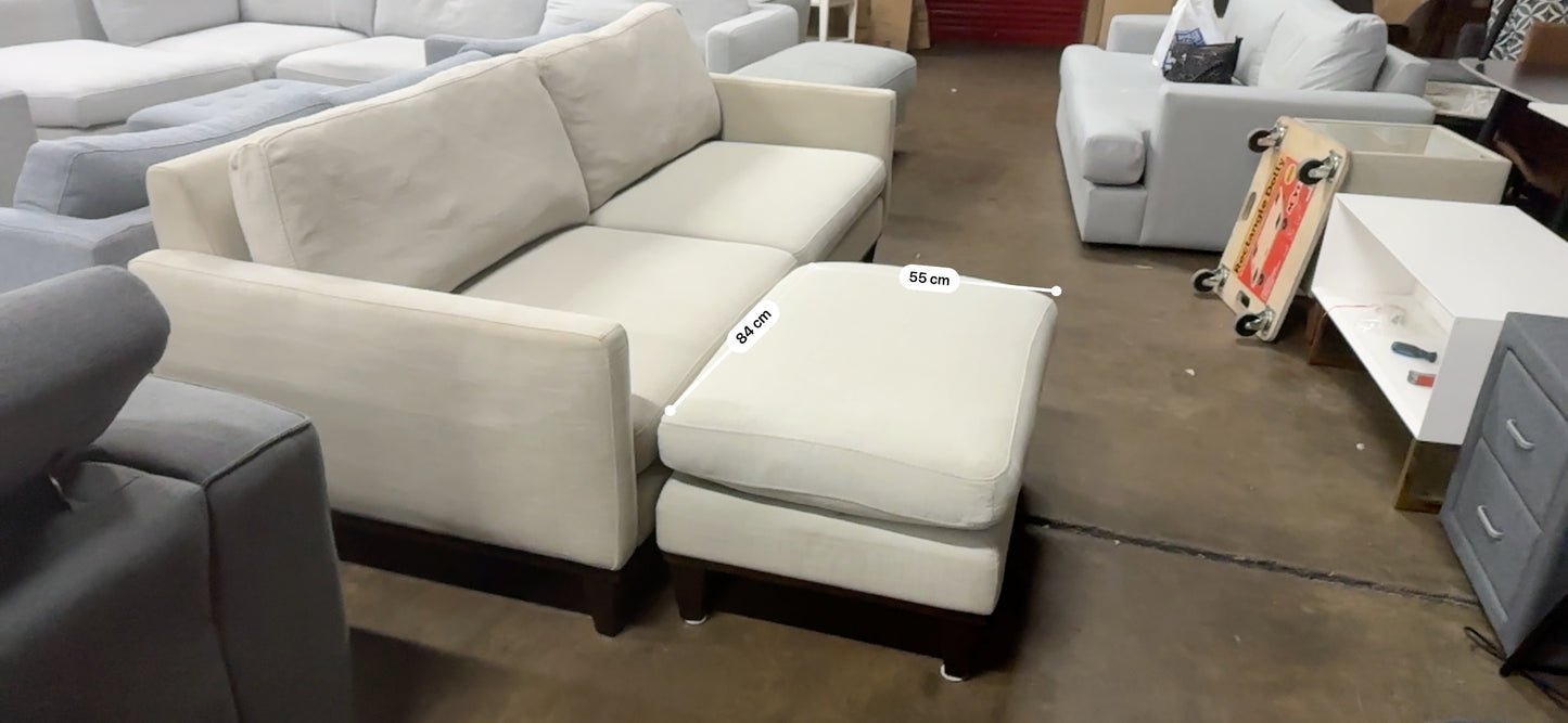 Affordable light grey color 2.5 seater and matching ottoman.