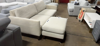 Affordable light grey color 2.5 seater and matching ottoman.