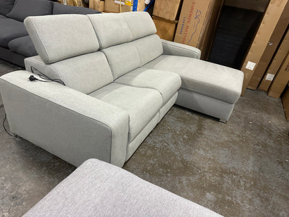 Nick Sclai Beautiful couch with super comfy seats. Light grey color. With electric recliner