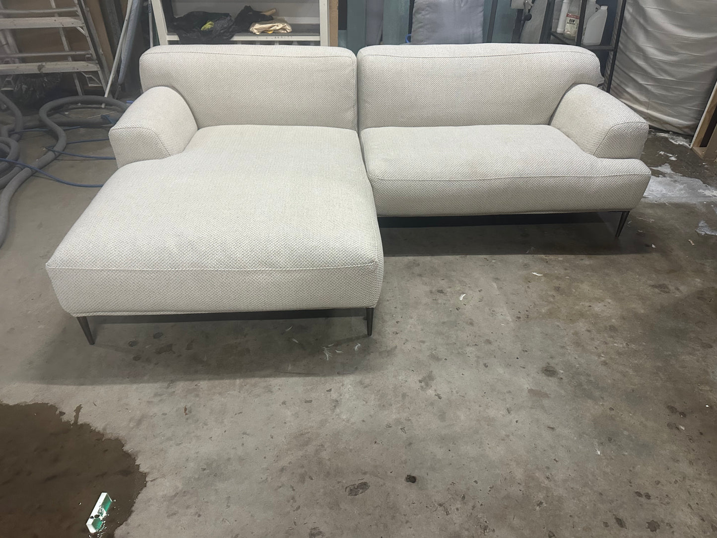 Cream color L shape sofa. Brosa brand