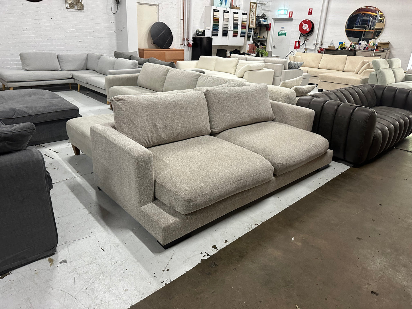 Massive deep seats 2.5 - 3 seater sofa. Feather filled cushions. Removable washable covers