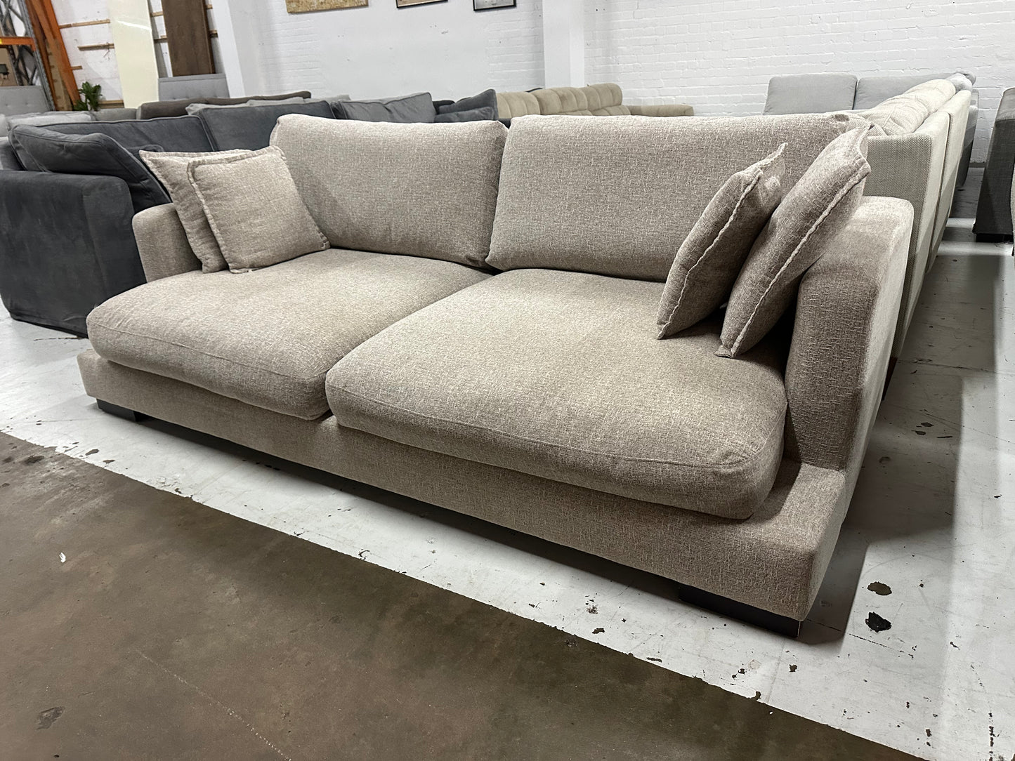Massive deep seats 2.5 - 3 seater sofa. Feather filled cushions. Removable washable covers