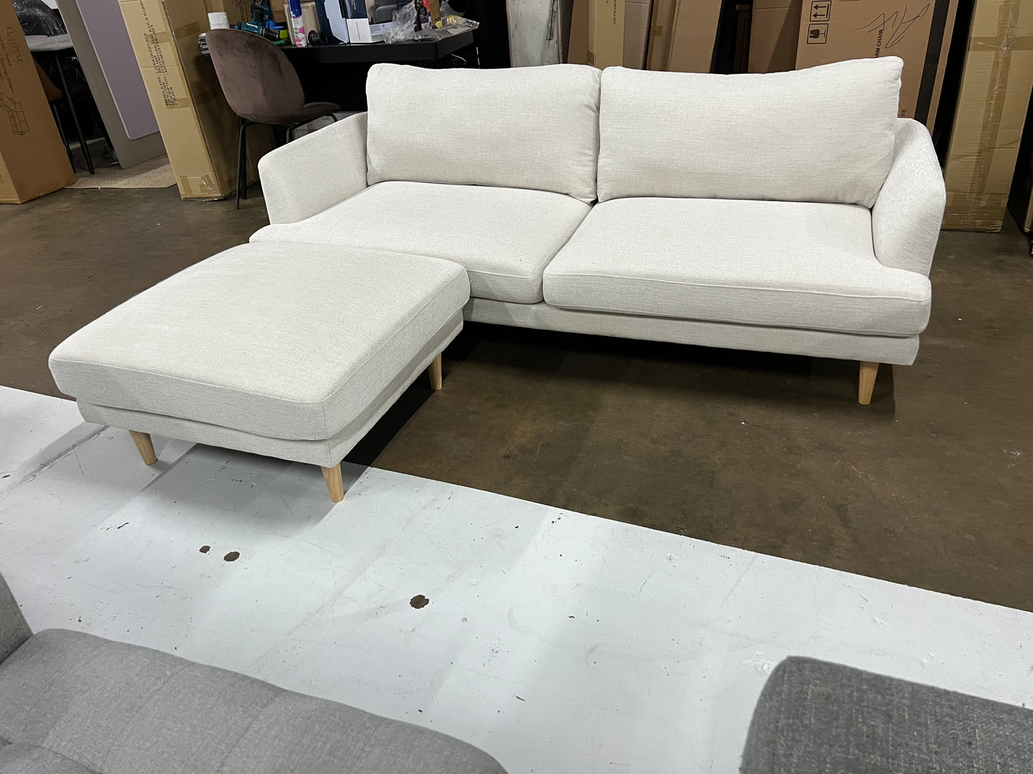 Lounge Lover's Sofa (Pre-Owned) cream color 2.5 seater with a matching ottoman.