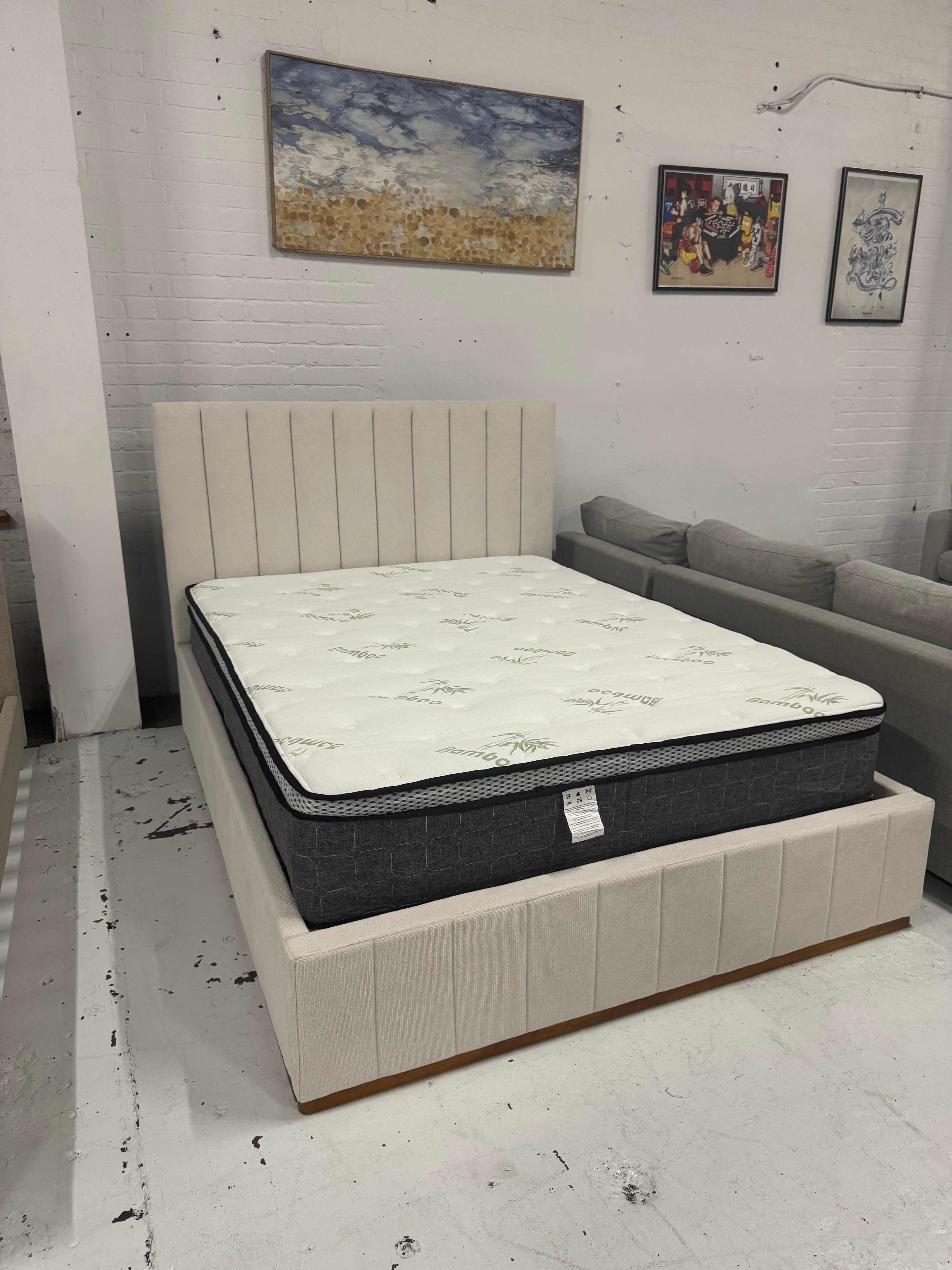 Cream color corduroy sofa and cream bed frame with mattress
