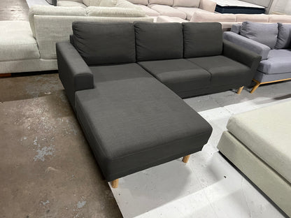 Great quality dark grey L shape sofa. Compact size perfect for city apartments