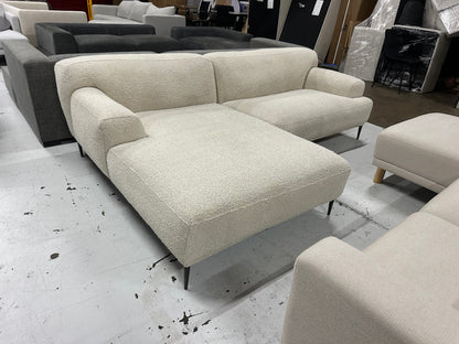 Cream color Boucle L shape sofa. Brosa brand