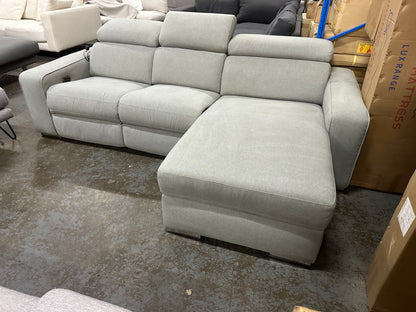 Nick Sclai Beautiful couch with super comfy seats. Light grey color. With electric recliner