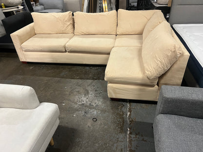 Affordable beige color 4-5 seater sofa.