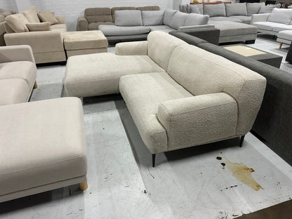 Cream color Boucle L shape sofa. Brosa brand