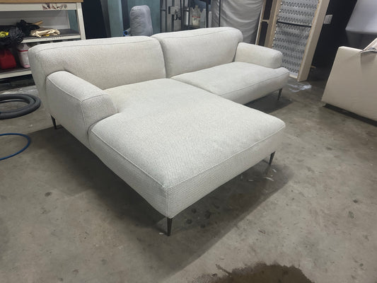 Cream color L shape sofa. Brosa brand
