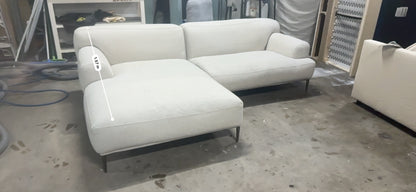 Cream color L shape sofa. Brosa brand