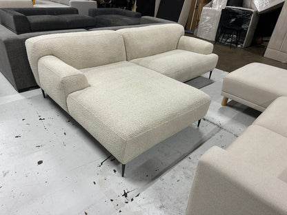 Cream color Boucle L shape sofa. Brosa brand