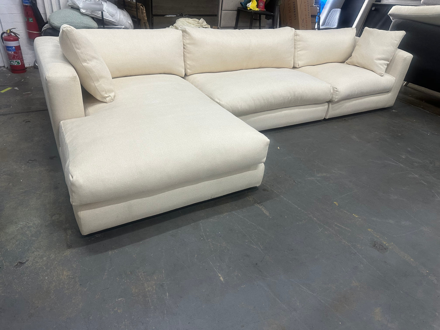 Top quality reupholstered Domayne L shape sofa. Removable cushion covers