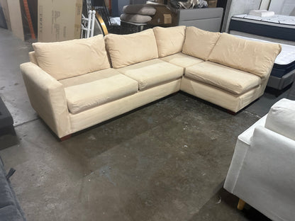 Affordable beige color 4-5 seater sofa.