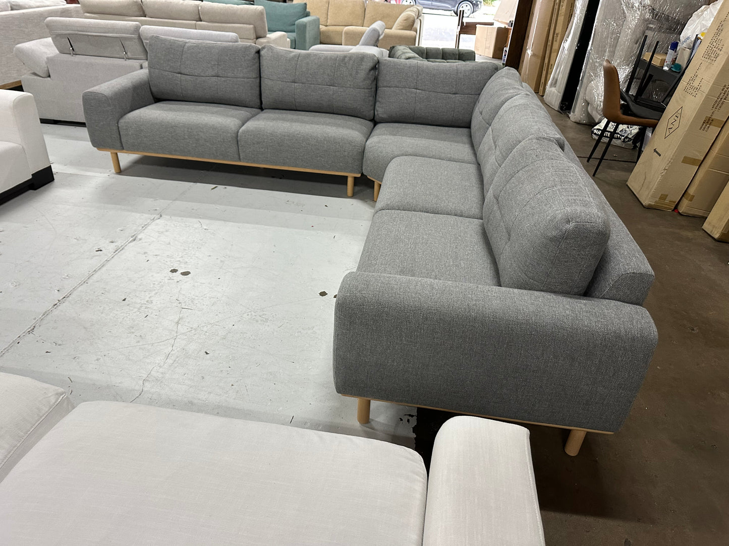 Dark grey color OzDesign chaise L shape Sofa (Pre-Owned). Perfect as new condition