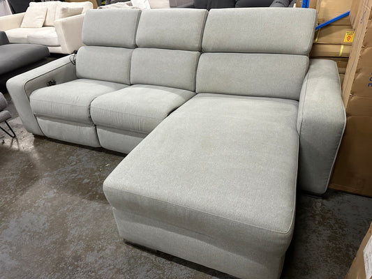 Nick Sclai Beautiful couch with super comfy seats. Light grey color. With electric recliner