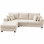 Cream color corduroy sofa and cream bed frame with mattress