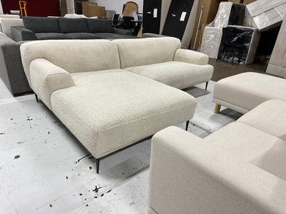 Cream color Boucle L shape sofa. Brosa brand