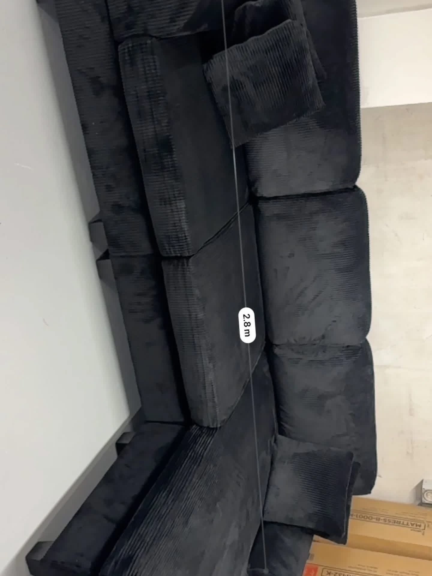 Noosa Corduroy Sofa. Black color reversible chaise.
