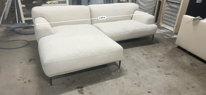 Cream color L shape sofa. Brosa brand