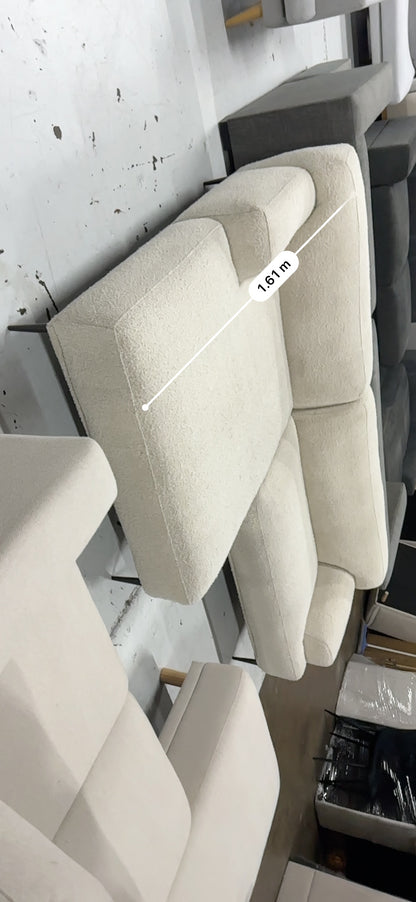 Cream color Boucle L shape sofa. Brosa brand