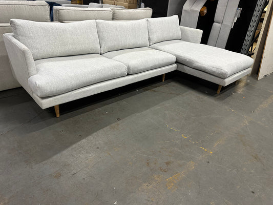 Beautiful couch with removable cushion covers. Light grey